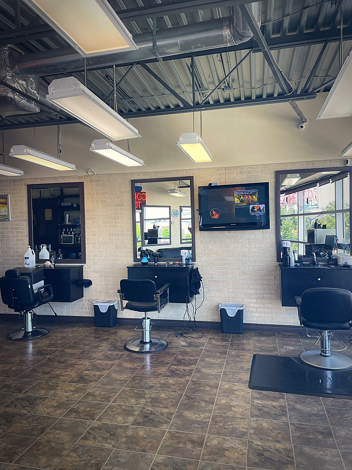 Wide view of the salon's barber stations